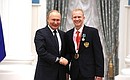 Presenting state decorations to winners of the 2020 Summer Paralympic Games in Tokyo. Dmitry Grigoryev, swimming champion of the Paralympics, receives the Order of Friendship. Photo: RIA Novosti