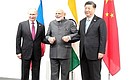 С Премьер-министром Индии Нарендрой Моди и Председателем КНР Си Цзиньпином перед началом встречи в формате Россия – Индия – Китай.