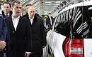 During visit to Gorky Automobile Plant. With Prime Minister Vladimir Putin.