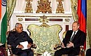 President Vladimir Putin talking with Indian Prime Minister Atal Bihari Vajpayee.