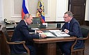 With Acting Governor of the Omsk Region Alexander Burkov. Photo: RIA Novosti