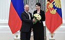 At a ceremony presenting state decorations. Olga Pogodina, actress and general director of film company ODA Film, was awarded the honorary title National Artist of the Russian Federation.
