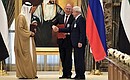 Exchange of documents signed during Vladimir Putin’s state visit to the United Arab Emirates.