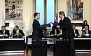 The ceremony of signing Russian-Argentinian documents. Russian Minister of Communications and Mass Media Nikolai Nikiforov and Argentinian Communications Secretary Alfredo Scoccimaro sign anagreement on cooperation in the field of mass communication.