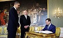 Запись в книге почётных гостей. С Президентом США Бараком Обамой и Президентом Чехии Вацлавом Клаусом.