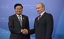 With Prime Minister of Lao People's Democratic Republic Thongloun Sisoulith. Photo: russia-asean20.ru