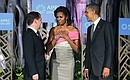 With US President Barack Obama and his spouse Michelle Obama.