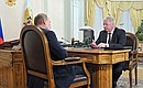 At a meeting with President of the Federation of Independent Trade Unions Mikhail Shmakov.