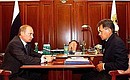 President Putin with Minister for Civil Defence, Emergency Situations and Disaster Relief Sergei Shoigu.
