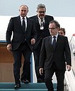 Vladimir Putin arrives in Turkey on a working visit. With Russian Ambassador to Turkey Alexei Yerkhov and Director General of Protocol of the Turkish Ministry of Foreign Affairs Sevki Mutevellioglu. Photo: TASS
