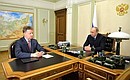 With Transport Minister Maxim Sokolov, head of the government commission for investigating the causes of the Russian passenger plane crash in Egypt.