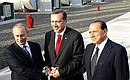 With Turkish Prime Minister Recep Tayyip Erdogan (in the centre) and Italian Prime Minister Silvio Berlusconi.