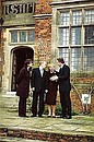 Vladimir and Lyudmila Putin with British Prime Minister Tony Blair and his wife, Cherie, at the Prime Minister\'s country residence.