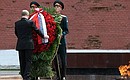 Vladimir Putin laid a wreath at the Tomb of the Unknown Soldier by the Kremlin wall on the Day of Memory and Grief.