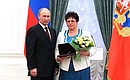 Galina Kalashnikova, a worker at the Magnitogorsk Bread Cmplex, was awarded the honorary title Merited Foodstuffs Industry Worker of the Russian Federation.