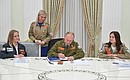 Vladimir Putin signed a book on the history of Russian student brigades.