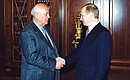 С бывшим президентом СССР Михаилом Горбачевым.