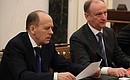 Director of the Federal Security Service Alexander Bortnikov (left) and Security Council Secretary Nikolai Patrushev at a meeting with permanent members of the Security Council.