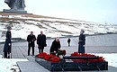 Laying flowers at the grave of Marshal of the Soviet Union Vasily Chuikov.