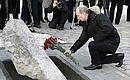 Laying flowers at the memorial to the victims of the 1962 Novocherkassk tragedy.