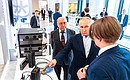 With Moscow State University Rector Viktor Sadovnichy (left) during a tour of the Lomonosov cluster project for advanced industrial technologies. Photo: Press Office of Moscow Mayor