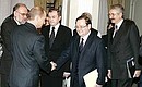 Перед началом встречи с Председателем Центральной избирательной комиссии Владимиром Чуровым (слева на втором плане) и руководителями избиркомов ряда регионов.