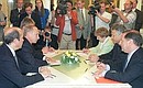 President Putin meeting with French Foreign Minister Dominique de Villepin.