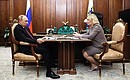 With Culture Minister Olga Lyubimova.