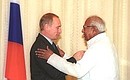 Ceremony awarding the Order of Friendship to Krishna Ayer, president of the Indian Society for Cultural Cooperation and Friendship.