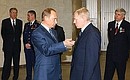 President Putin with the head of the Federal Space Agency, Anatoly Perminov.
