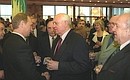 Vladimir Putin and Mikhail Gorbachev, the first and last President of the Soviet Union, at a party after the inauguration ceremony.