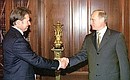 President Vladimir Putin with Sergei Bogdanchikov, president of Rosneft.
