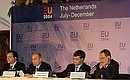 At a joint press conference with European President Jose Manuel Barroso (left), Dutch Prime Minister Jan Peter Balkenende and EU High Representative for the Common Foreign and Security Policy Javier Solana (far right).