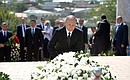Laying flowers at the tomb of Islam Karimov.