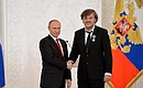 At a ceremony marking National Unity Day, Vladimir Putin presented the Order of Friendship to film director Emir Kusturica.