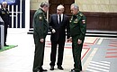 Before the expanded meeting of the Board of the Defence Ministry. With Defence Minister Sergei Shoigu, right, and Chief of the Armed Forces General Staff Valery Gerasimov.