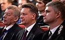Transport Minister Maxim Sokolov (centre) and Russian Railways CEO Oleg Belozerov (right) at the plenary meeting of the Congress of Transport Workers of Russia.