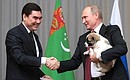 President of Turkmenistan Gurbanguly Berdimuhamedov presented a Central Asian Shepherd (Alabai) puppy to Vladimir Putin. Photo: TASS