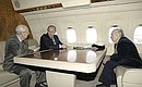 Во время перелета в Польшу с ветеранами Ириной Хариной и Иваном Мартынушкиным.