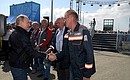 With Crimean Bridge construction workers. Before the ceremonial rally and concert marking the opening of the Crimean Bridge motorway section.