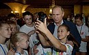 Во время посещения Всероссийского детского спортивно-оздоровительного центра в Сочи.