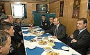 President Putin meeting the crew of the Russian patrol ship Neustrashimy. Seen in the photo (right) is Prince Andrew, Duke of York.
