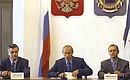 President Putin with Alexander Abramov, deputy head of the Presidential Executive Office (left), and Sergei Kiriyenko, Presidential Plenipotentiary Envoy to the Volga Federal District, at a conference on the social and economic development of the Volga Federal District.