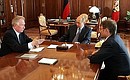Рабочая встреча с Президентом Бурятии Леонидом Потаповым (слева) и Министром экономического развития и торговли Германом Грефом.