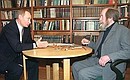 Russian President Vladimir Putin and writer Alexander Solzhenitsyn.