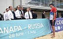 With Prime Minister Dmitry Medvedev and Security Council Secretary Nikolai Patrushev during a visit to the VolleyGrad sports and fitness centre.