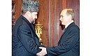 President Putin with the head of the Chechen administration, Akhmat Kadyrov.