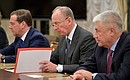 Deputy Chairman of the Security Council Dmitry Medvedev, Secretary of the Security Council Nikolai Patrushev and Interior Minister Vladimir Kolokoltsev at a meeting with permanent members of the Security Council.