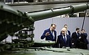 During a visit to the Uralvagonzavod Research and Production Corporation. The tour was led by Uralvagonzavod Director General Alexander Potapov. Photo by Ramil Sitdikov, RIA Novosti