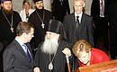 With Archbishop of Yekaterinburg and Verkhoturye Vikenty and Federal Chancellor of Germany Angela Merkel in the Church on Blood in Honour of All Saints Resplendent in the Russian Land.